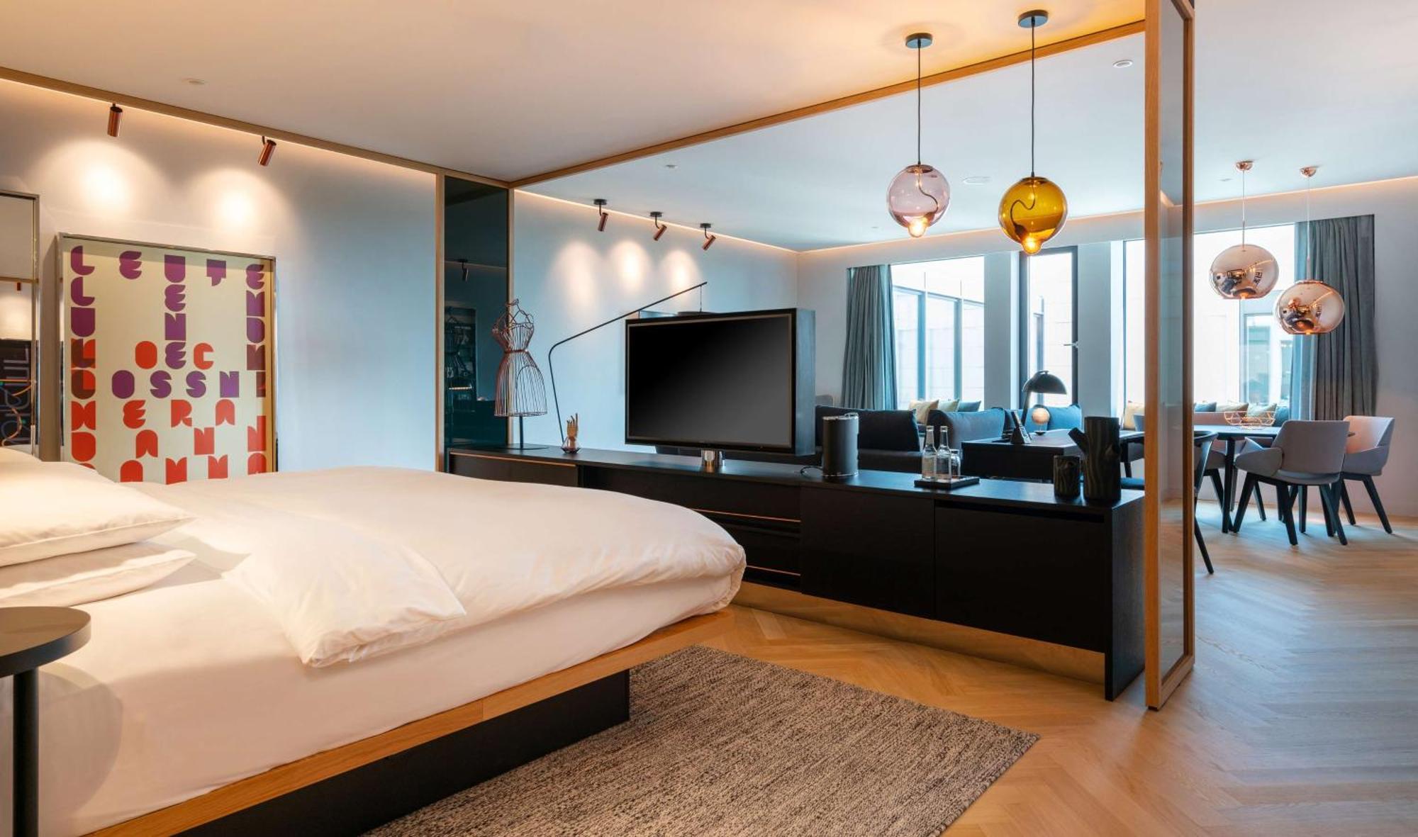 ホテル アンダーズ ミュンヘン シュヴァビンガー トーア ア コンセプト バイ ハイアット エクステリア 写真 A bedroom at the hotel