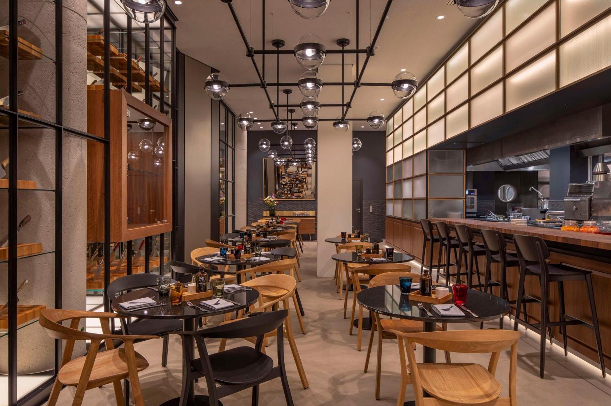 ホテル アンダーズ ミュンヘン シュヴァビンガー トーア ア コンセプト バイ ハイアット エクステリア 写真 Interior of the restaurant